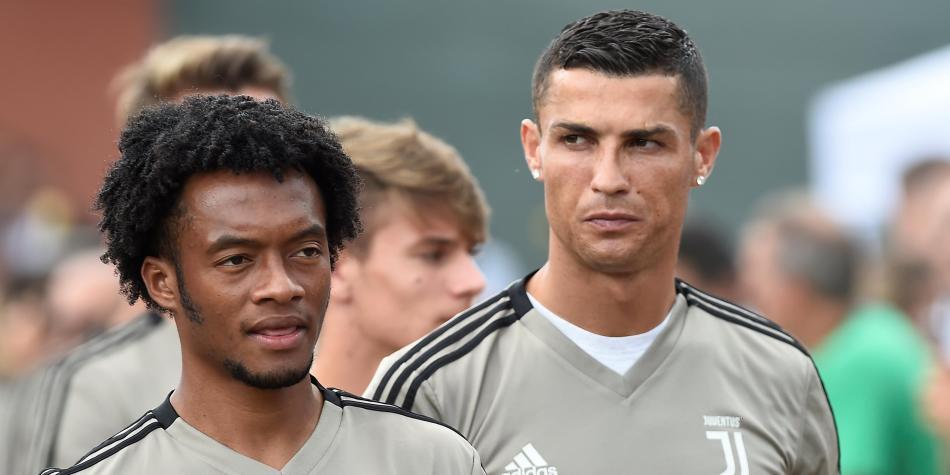 Juan Guillermo Cuadrado y Cristiano Ronaldo