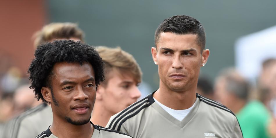 Juan Guillermo Cuadrado y Cristiano Ronaldo