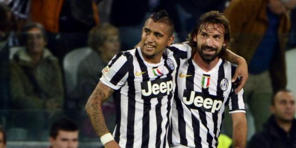 Arturo Vidal y Andrea Pirlo
