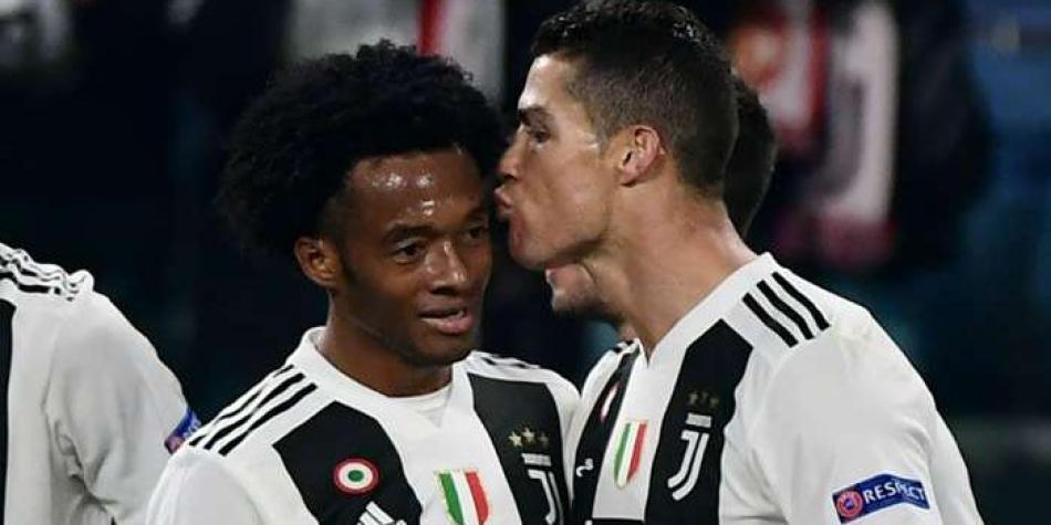 Juan Guillermo Cuadrado y Cristiano Ronaldo