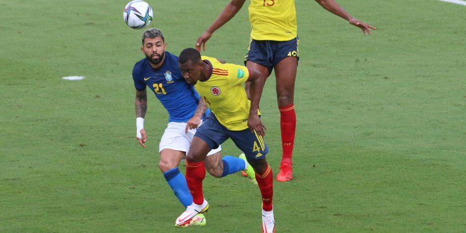 Carlos Cuesta y Yerry Mina
