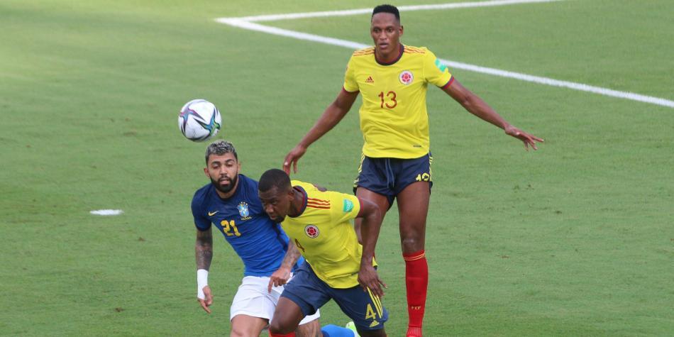 Carlos Cuesta y Yerry Mina