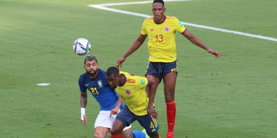 Carlos Cuesta y Yerry Mina