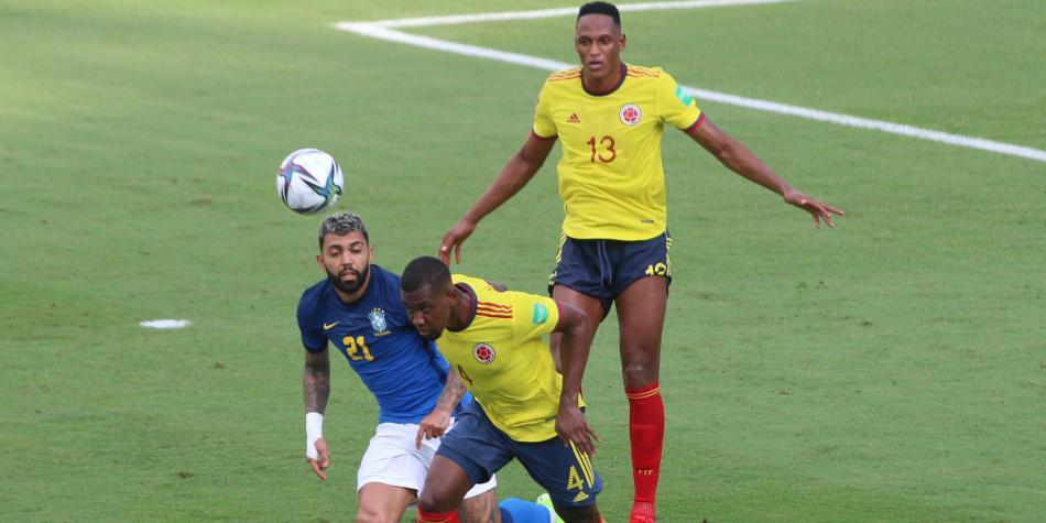 Carlos Cuesta y Yerry Mina