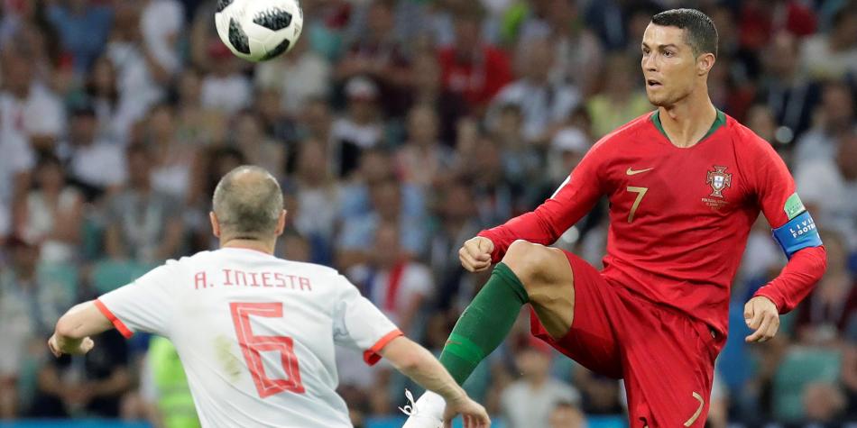 Andrés Iniesta y Cristiano Ronaldo