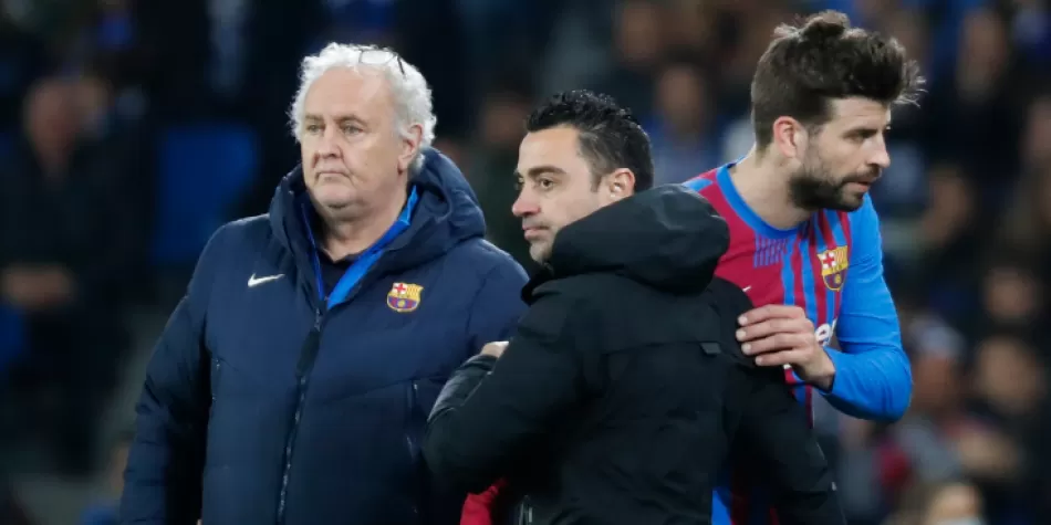Xavi Hernández y Gerard Piqué