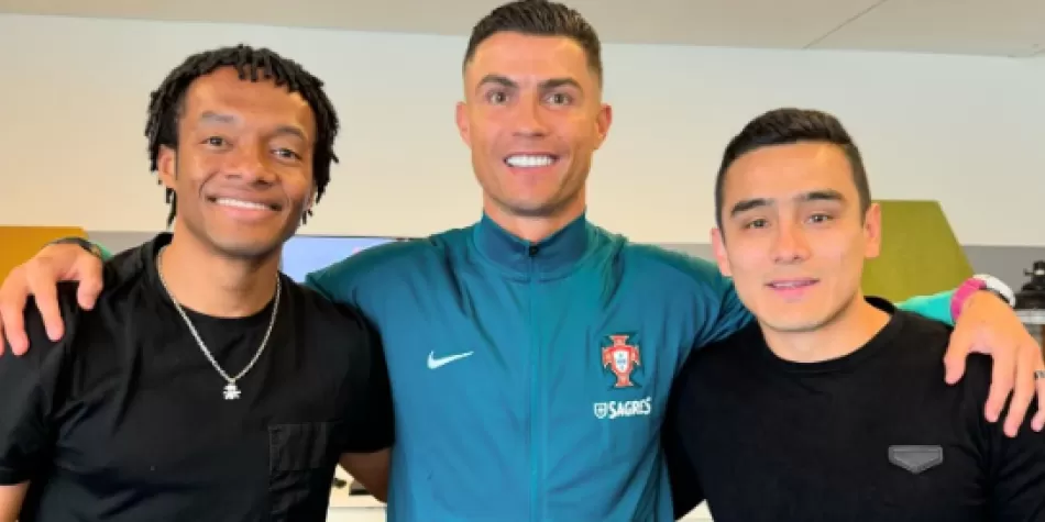 Juan Cuadrado y Cristiano Ronaldo