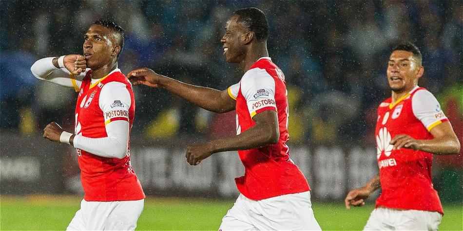 Johan Arango (izq.) le dio el gol del triunfo a Santa Fe sobre Millonarios.