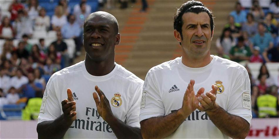 Clarence Seedorf (izq.), excentrocampista de Real Madrid, de España.