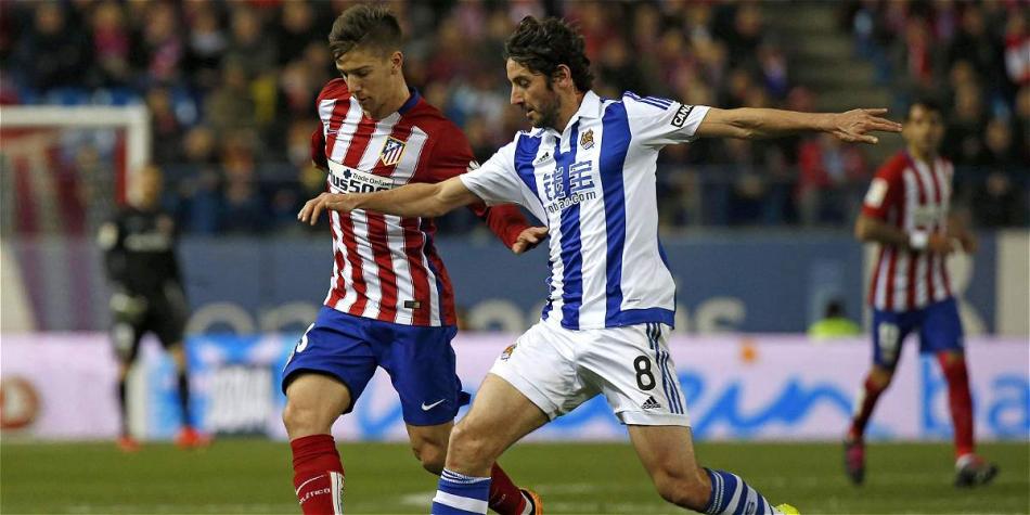 Acción de juego del partido entre Atlético de Madrid y la Real Sociedad.