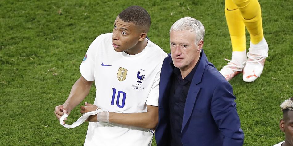 Mbappé y Deschamps