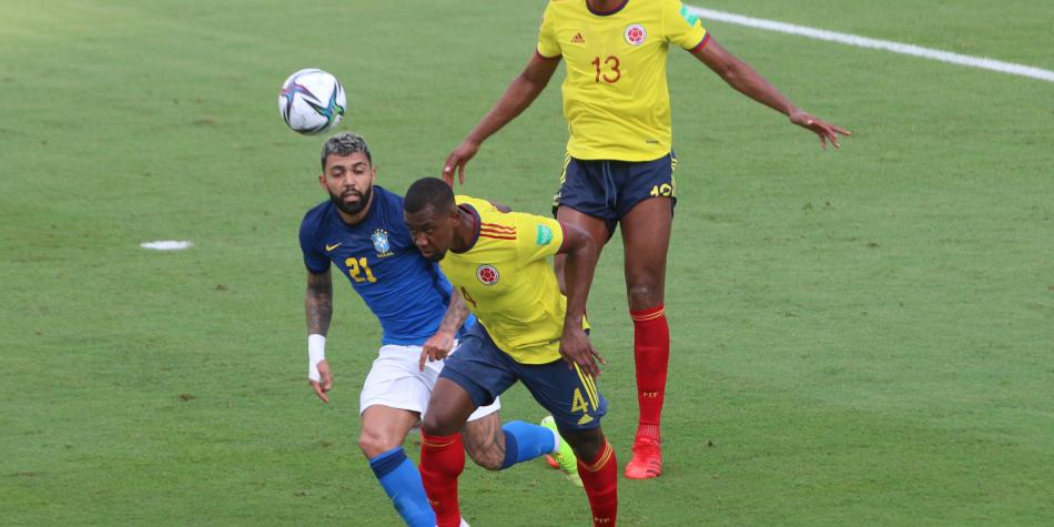 Carlos Cuesta y Yerry Mina