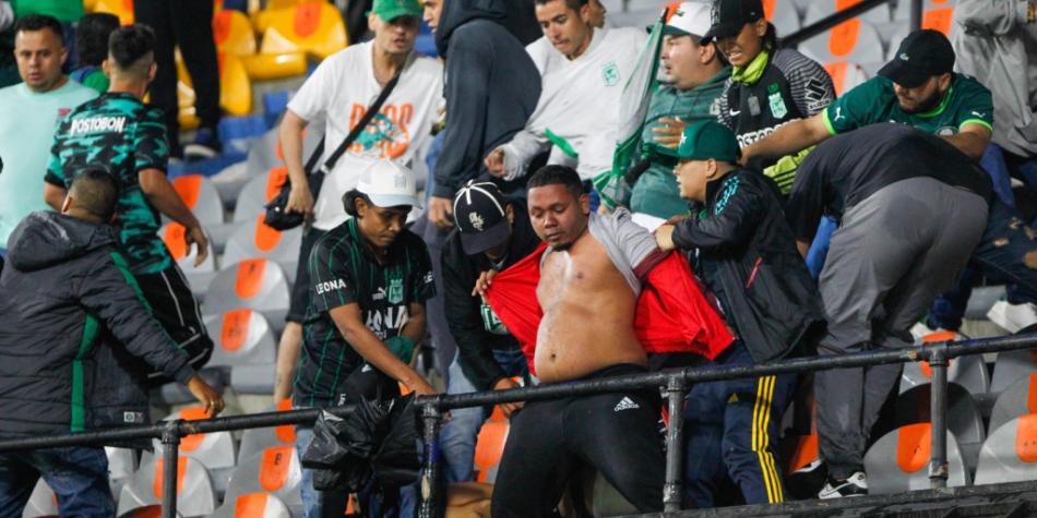 Desmanes Nacional vs Junior