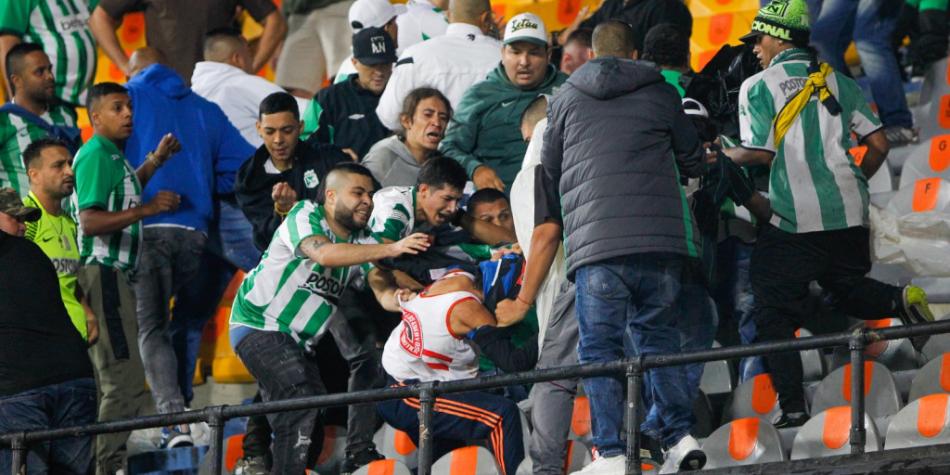 Desmanes Nacional vs Junior
