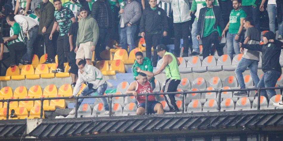 Desmanes Nacional vs Junior